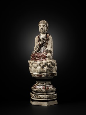 Lot 145 - A RARE AND LARGE CIZHOU POLYCHROME POTTERY FIGURE OF BUDDHA, JIN DYNASTY
