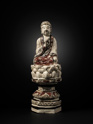 Lot 145 - A RARE AND LARGE CIZHOU POLYCHROME POTTERY FIGURE OF BUDDHA, JIN DYNASTY