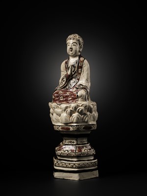Lot 145 - A RARE AND LARGE CIZHOU POLYCHROME POTTERY FIGURE OF BUDDHA, JIN DYNASTY