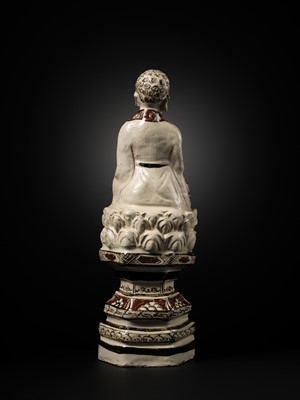 Lot 145 - A RARE AND LARGE CIZHOU POLYCHROME POTTERY FIGURE OF BUDDHA, JIN DYNASTY