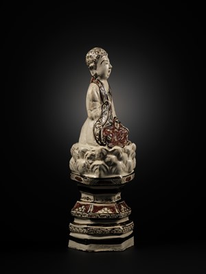 Lot 145 - A RARE AND LARGE CIZHOU POLYCHROME POTTERY FIGURE OF BUDDHA, JIN DYNASTY