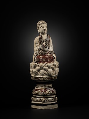 Lot 145 - A RARE AND LARGE CIZHOU POLYCHROME POTTERY FIGURE OF BUDDHA, JIN DYNASTY