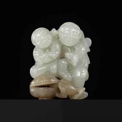 Lot 456 - A WHITE AND PALE BROWN JADE ‘HE HE ERXIAN’ GROUP, 18TH CENTURY