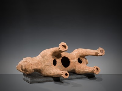 Lot 128 - A VERY LARGE SICHUAN POTTERY MODEL OF A HARNESSED DOG, HAN DYNASTY