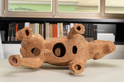 Lot 128 - A VERY LARGE SICHUAN POTTERY MODEL OF A HARNESSED DOG, HAN DYNASTY
