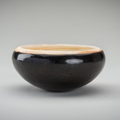 Lot 1841 - A BLACK GLAZED PORCELAIN ALMS BOWL, PROBABLY TANG DYNASTY