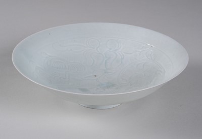 Lot 1848 - A QINGBAI GLAZED ‘AUSPICIOUS FLOWERS’ PORCELAIN BOWL, PROBABLY SONG DYNASTY