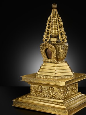 Lot 8 - A GILT AND INSCRIBED COPPER ALLOY STUPA, CHORTEN, 18TH CENTURY