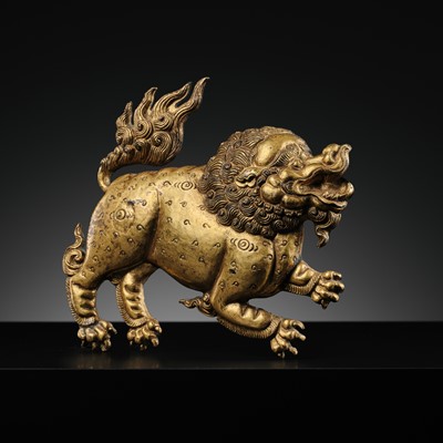 Lot 285 - A GILT-COPPER REPOUSSÉ ‘LION’ PLAQUE, TIBET, 17TH-18TH CENTURY