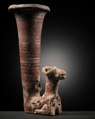 Lot 213 - A LARGE PERSIAN POTTERY ‘RAM’ RHYTON, 1ST MILLENNIUM AD