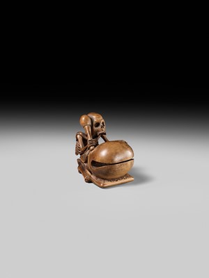 Lot 468 - TOMOKAZU: A WOOD NETSUKE OF A SKELETON AND MOKUGYO