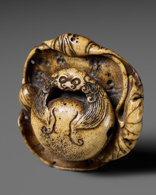 Lot 330 - KOZAN: A FINE ANTLER NETSUKE OF A MOKUGYO ON A LOTUS LEAF