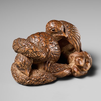 Lot 165 - RYUSENSHI: A RARE WOOD NETSUKE OF TWO QUAILS ON MILLET