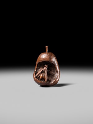 Lot 175 - KOGETSU: A SUPERB NAGOYA SCHOOL NETSUKE OF A WASP INSIDE A DECAYING PEAR