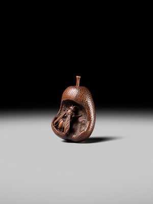 Lot 175 - KOGETSU: A SUPERB NAGOYA SCHOOL NETSUKE OF A WASP INSIDE A DECAYING PEAR