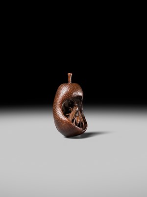 Lot 175 - KOGETSU: A SUPERB NAGOYA SCHOOL NETSUKE OF A WASP INSIDE A DECAYING PEAR