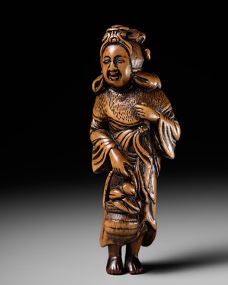 Lot 73 - A TALL WOOD NETSUKE OF SEIOBO