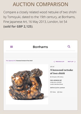 Lot 480 - TOMOHARU: A LARGE AND POWERFUL WOOD NETSUKE OF TWO SHISHI