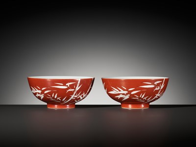 Lot 161 - A FINE AND RARE PAIR OF CORAL-GROUND REVERSE-DECORATED 'BAMBOO' BOWLS, QIANLONG MARK AND PERIOD