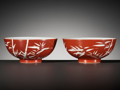 Lot 161 - A FINE AND RARE PAIR OF CORAL-GROUND REVERSE-DECORATED 'BAMBOO' BOWLS, QIANLONG MARK AND PERIOD