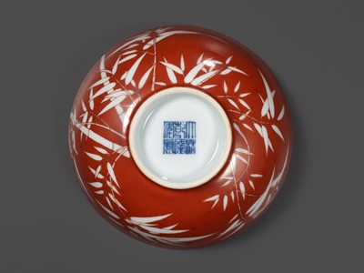 Lot 161 - A FINE AND RARE PAIR OF CORAL-GROUND REVERSE-DECORATED 'BAMBOO' BOWLS, QIANLONG MARK AND PERIOD