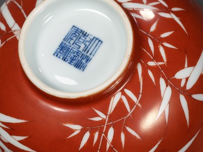 Lot 161 - A FINE AND RARE PAIR OF CORAL-GROUND REVERSE-DECORATED 'BAMBOO' BOWLS, QIANLONG MARK AND PERIOD