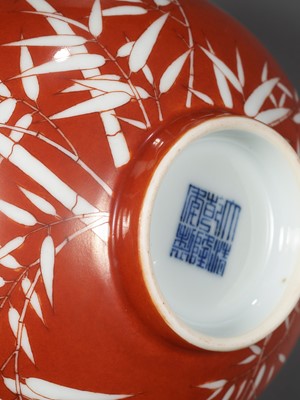 Lot 161 - A FINE AND RARE PAIR OF CORAL-GROUND REVERSE-DECORATED 'BAMBOO' BOWLS, QIANLONG MARK AND PERIOD