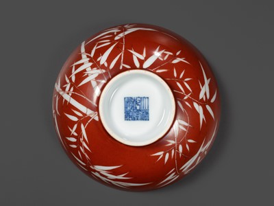 Lot 161 - A FINE AND RARE PAIR OF CORAL-GROUND REVERSE-DECORATED 'BAMBOO' BOWLS, QIANLONG MARK AND PERIOD