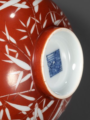 Lot 161 - A FINE AND RARE PAIR OF CORAL-GROUND REVERSE-DECORATED 'BAMBOO' BOWLS, QIANLONG MARK AND PERIOD