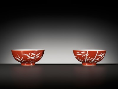 Lot 161 - A FINE AND RARE PAIR OF CORAL-GROUND REVERSE-DECORATED 'BAMBOO' BOWLS, QIANLONG MARK AND PERIOD