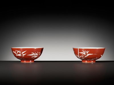 Lot 161 - A FINE AND RARE PAIR OF CORAL-GROUND REVERSE-DECORATED 'BAMBOO' BOWLS, QIANLONG MARK AND PERIOD