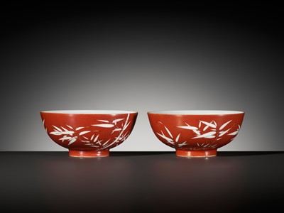 Lot 161 - A FINE AND RARE PAIR OF CORAL-GROUND REVERSE-DECORATED 'BAMBOO' BOWLS, QIANLONG MARK AND PERIOD