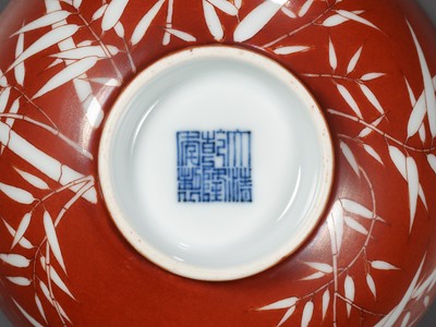 Lot 161 - A FINE AND RARE PAIR OF CORAL-GROUND REVERSE-DECORATED 'BAMBOO' BOWLS, QIANLONG MARK AND PERIOD