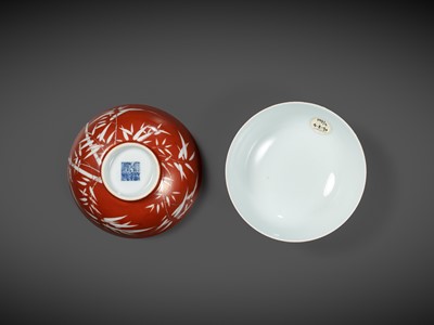 Lot 161 - A FINE AND RARE PAIR OF CORAL-GROUND REVERSE-DECORATED 'BAMBOO' BOWLS, QIANLONG MARK AND PERIOD