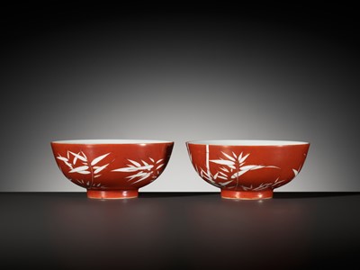 Lot 161 - A FINE AND RARE PAIR OF CORAL-GROUND REVERSE-DECORATED 'BAMBOO' BOWLS, QIANLONG MARK AND PERIOD