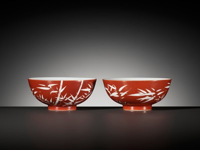 Lot 161 - A FINE AND RARE PAIR OF CORAL-GROUND REVERSE-DECORATED 'BAMBOO' BOWLS, QIANLONG MARK AND PERIOD