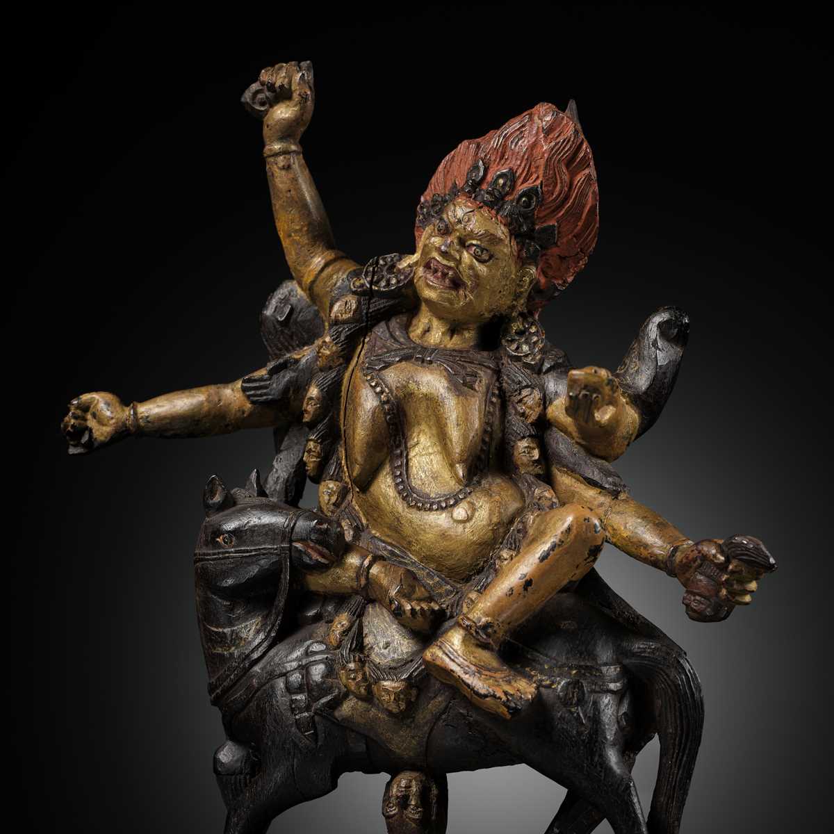 Lot 290 - A GILT AND LACQUERED ZITAN FIGURE OF PALDEN