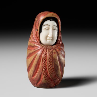 Lot 519 - A LACQUERED AND INLAID WOOD KARAKURI (TRICK) NETSUKE OF ONNA DARUMA