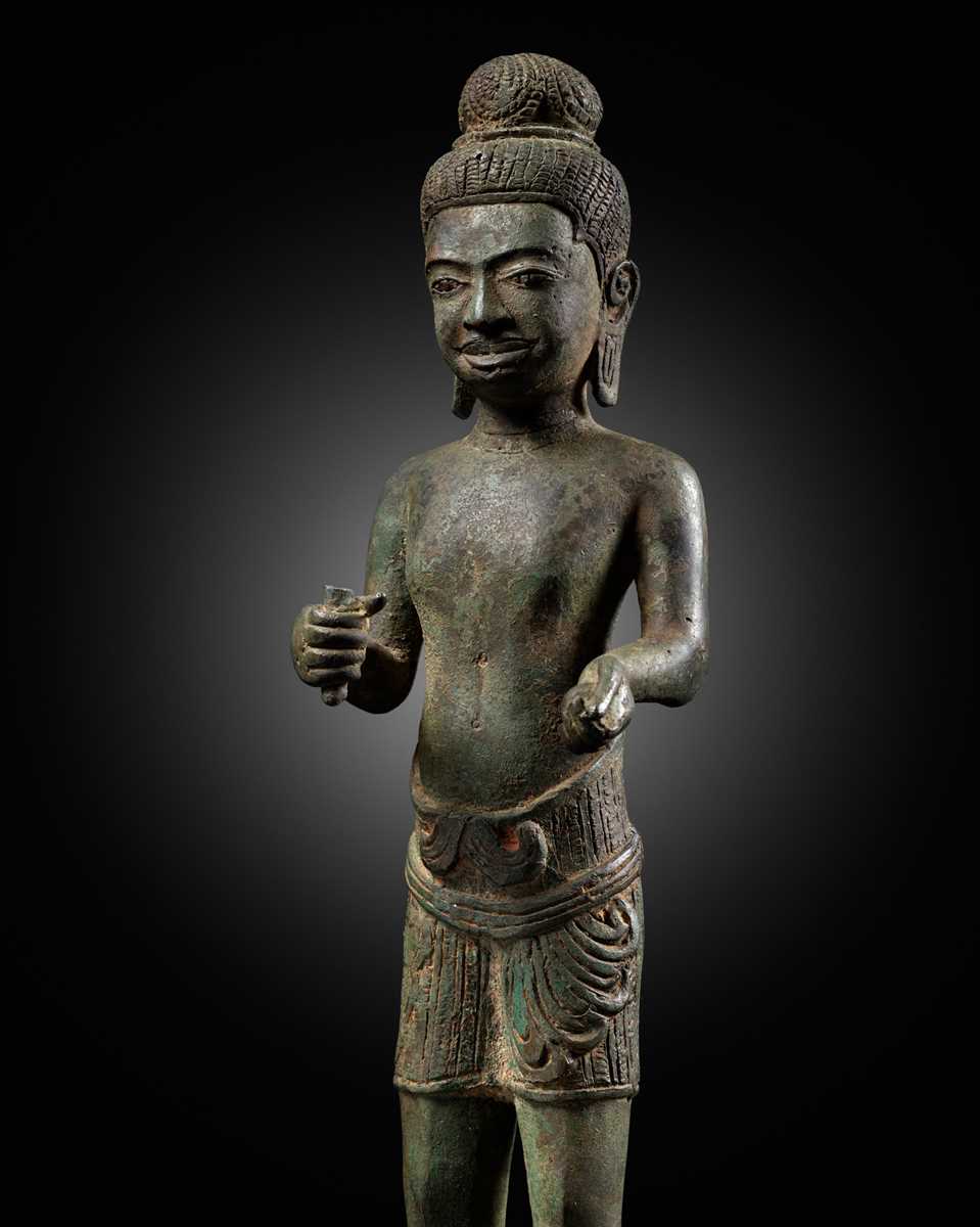 Lot 340 - A BRONZE FIGURE OF A BODHISATTVA, ANGKOR PERIOD, BANTEAY SREI STYLE