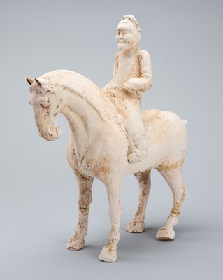 Lot 1834 - A POTTERY TOMB FIGURE OF AN EQUESTRIAN, HAN TO TANG DYNASTY