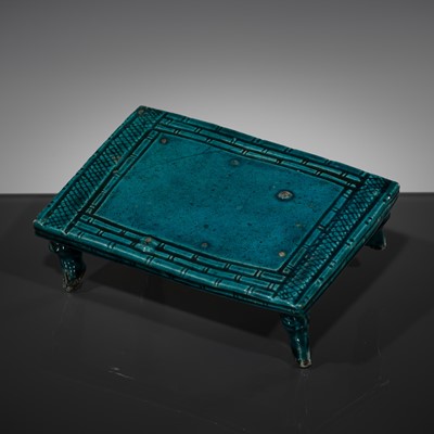 Lot 558 - A TURQUOISE-GLAZED ‘BAMBOO BED’ STAND, KANGXI PERIOD