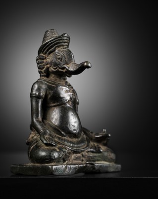 Lot 265 - A FINE BRONZE FIGURE OF GANESHA, KHMER EMPIRE, ANGKOR WAT STYLE