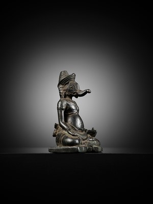 Lot 265 - A FINE BRONZE FIGURE OF GANESHA, KHMER EMPIRE, ANGKOR WAT STYLE