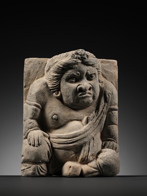 Lot 525 - A PAIR OF FIGURAL POTTERY TILES DEPICTING ATLANTES, XI XIA DYNASTY