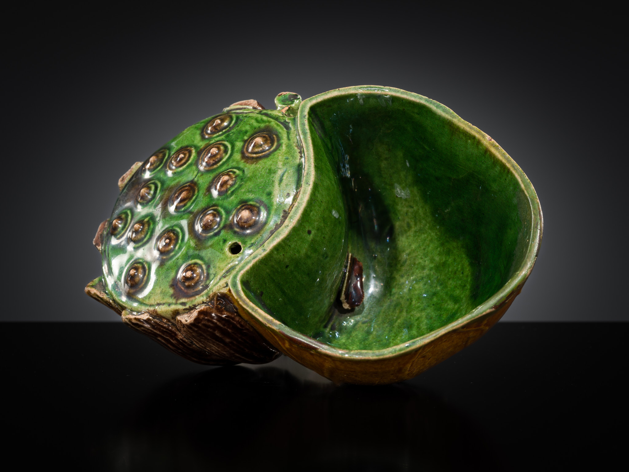 Lot 557 - A FAMILLE VERTE BISCUIT LOTUS-FORM WATER