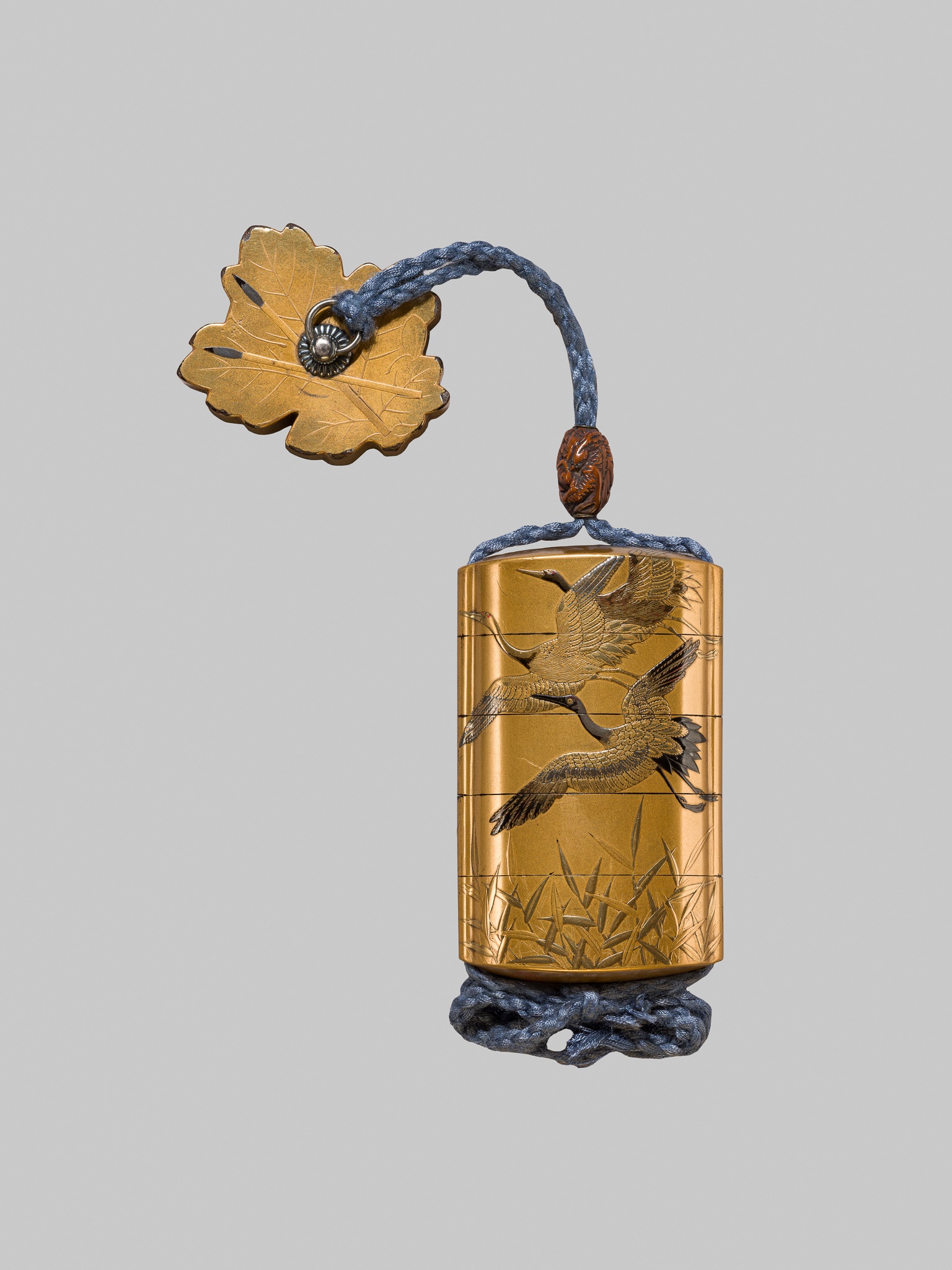 Lot 21 - KAJIKAWA: A FINE FOUR-CASE GOLD LACQUER INRO