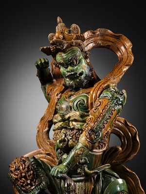 Lot 147 - A LARGE AND IMPOSING SANCAI FIGURE OF THE DAOIST GUARDIAN WANG LINGGUAN, LATE MING DYNASTY