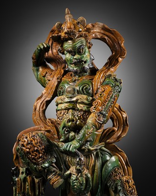 Lot 147 - A LARGE AND IMPOSING SANCAI FIGURE OF THE DAOIST GUARDIAN WANG LINGGUAN, LATE MING DYNASTY