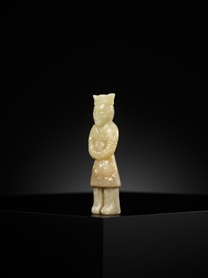 A YELLOW JADE ‘MALE ATTENDANT’ PENDANT, WARRING STATES PERIOD