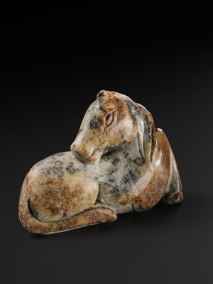 A MOTTLED GRAY AND RUSSET JADE FIGURE OF A HORSE, MING DYNASTY
